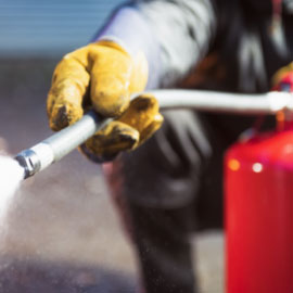 fire extinguisher being sprayed