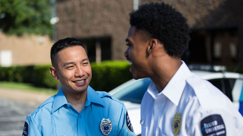 Security officers smiling