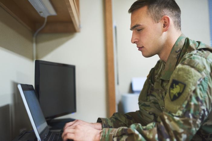 Soldier using a laptop