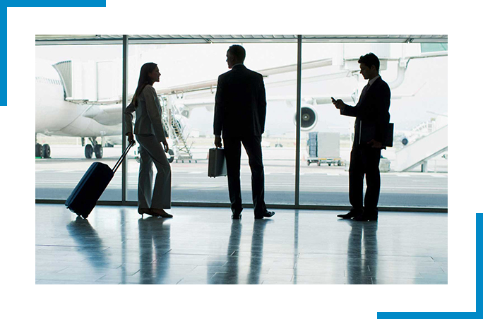 3 people standing at the airport